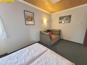 Postel nebo postele na pokoji v ubytování Apartment Almkogel
