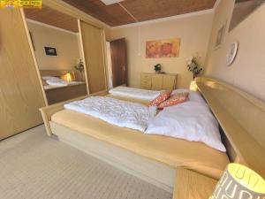 Postel nebo postele na pokoji v ubytování Apartment Almkogel