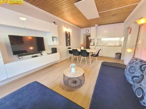 TV a/nebo společenská místnost v ubytování Apartment Almkogel