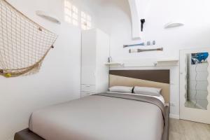 Katil atau katil-katil dalam bilik di La Suite del Monaco Marinaio