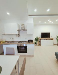 Η κουζίνα ή μικρή κουζίνα στο PaMa House comfort e relax a due passi dal centro