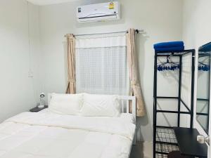 Postel nebo postele na pokoji v ubytování Yada House
