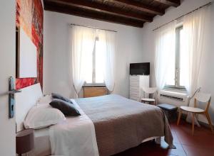 En eller flere senge i et værelse på Room with a View