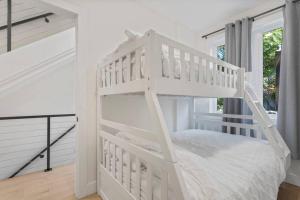 Ένα ή περισσότερα κρεβάτια σε δωμάτιο στο Townhouse at Capitol Hill 4 with Rooftop