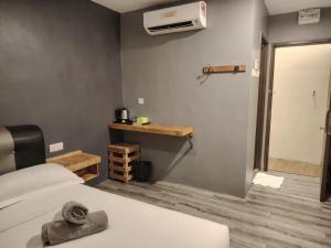G9 Hotel Alor Setar客房内的一张或多张床位