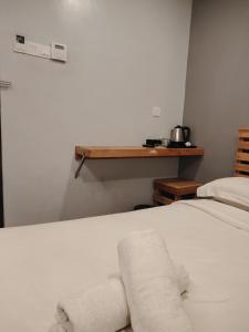 G9 Hotel Alor Setar客房内的一张或多张床位