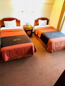 Katil atau katil-katil dalam bilik di Hotel Continental Lima