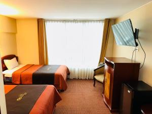 Katil atau katil-katil dalam bilik di Hotel Continental Lima
