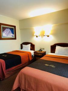 Katil atau katil-katil dalam bilik di Hotel Continental Lima