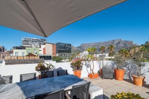 a view of the mountains from the roof of a house at Casa Velasur, De Waterkant in Cape Town