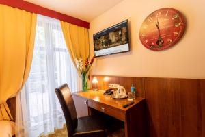 Sjónvarps- og/eða afþreyingartæki á David Boutique Hotel