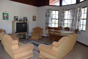 TV a/nebo společenská místnost v ubytování Eulen Villa 3Bed