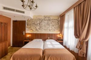 Rúm í herbergi á David Boutique Hotel