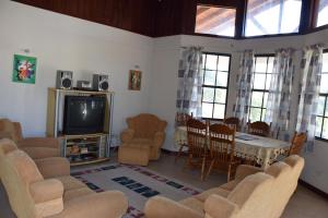 TV a/nebo společenská místnost v ubytování Eulen Villa 3Bed