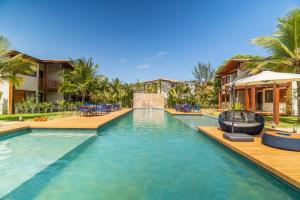 an image of a swimming pool at a resort at Villagio di Mare in Barra Grande
