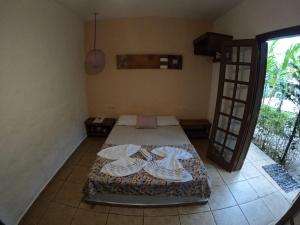 Posteľ alebo postele v izbe v ubytovaní Refúgio do Kairós