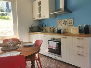 Kuchyňa alebo kuchynka v ubytovaní Ti Laouen - maison cocooning vue mer