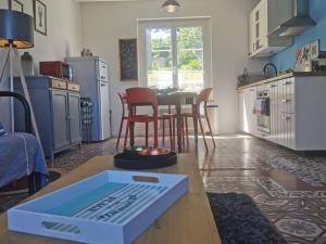 Kuchyňa alebo kuchynka v ubytovaní Ti Laouen - maison cocooning vue mer