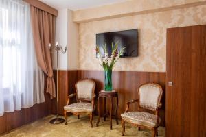 Sjónvarps- og/eða afþreyingartæki á David Boutique Hotel
