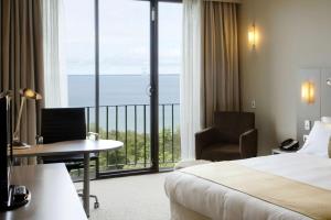 Lova arba lovos apgyvendinimo įstaigoje Hilton Garden Inn Darwin