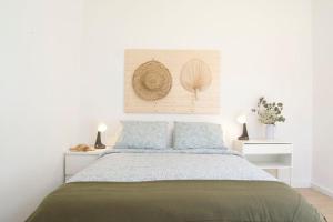 Ένα ή περισσότερα κρεβάτια σε δωμάτιο στο Apartamento Real