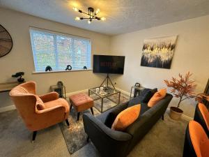 TV a/nebo společenská místnost v ubytování No56 - 2-bed Boutique Apartment - Hosted by Hutch Lifestyle + 41 fotografií