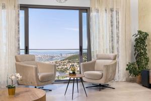 Posezení v ubytování Villa Rivendell Excelsior - Casino, Cinema, Tennis