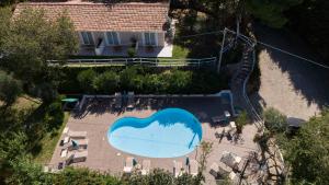 Bazén v ubytování UNICO Cannamele Escape Tropea by Life Resorts nebo v jeho okolí