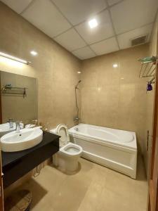 Koupelna v ubytování Nam Đông hotel + 31 fotografií
