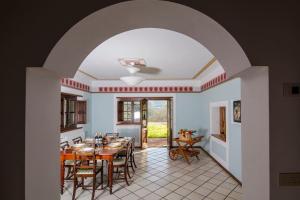 a dining room with a table and chairs at Villa Montermoli Tuskany in Santa Maria