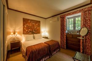 Ένα ή περισσότερα κρεβάτια σε δωμάτιο στο Casa das Naves de Sto António +75 φωτογραφίες