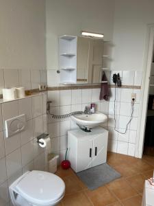 Koupelna v ubytování Doppelzimmer mit Terrasse in privatem Zuhause