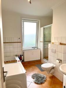 Koupelna v ubytování Doppelzimmer mit Terrasse in privatem Zuhause