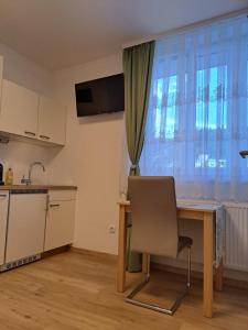 Kuchyň nebo kuchyňský kout v ubytování Private Zimmer HoAp