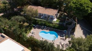 Bazén v ubytování UNICO Cannamele Escape Tropea by Life Resorts nebo v jeho okolí