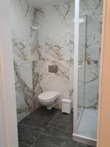 Koupelna v ubytování Private Zimmer HoAp