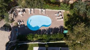 Bazén v ubytování UNICO Cannamele Escape Tropea by Life Resorts nebo v jeho okolí