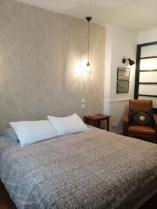 Postel nebo postele na pokoji v ubytování Le Quai 18