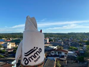 a bag with the word amazon is sitting on top of a city at Hotel AMMA in Orito