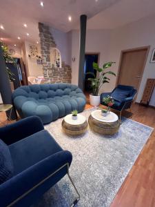 Et opholdsområde på Barbaras Felsenlodge + 31 billeder