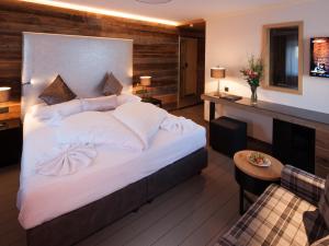 Postel nebo postele na pokoji v ubytování Boutique Hotel die Mittagspitze Superior