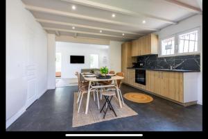 Η κουζίνα ή μικρή κουζίνα στο Maison à deux pas du port