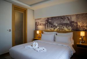 Cama ou camas em um quarto em ONOMO Hotel Rabat Terminus