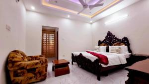 Ένα ή περισσότερα κρεβάτια σε δωμάτιο στο Haven Lodge, Bahria Enclave Islamabad