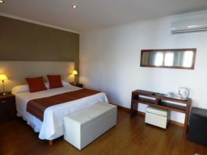Llit o llits en una habitació de Villa Nuccia Hotel Boutique