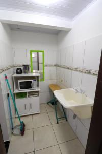 Kuchyň nebo kuchyňský kout v ubytování Apartamentos Ohana + 37 fotografií