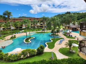 an aerial view of a pool at a resort at Flat no Resort em Angra Dos Reis RJ in Angra dos Reis