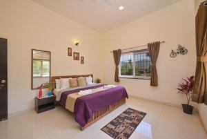 Postel nebo postele na pokoji v ubytování Silver Spring Villa by Tropicana Stays