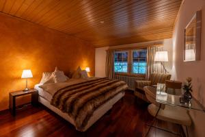 Postel nebo postele na pokoji v ubytování Chalet Les Ecureuils by Inspiringplaces Zermatt