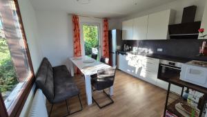 Kuchyňa alebo kuchynka v ubytovaní Cottage Alpenblick